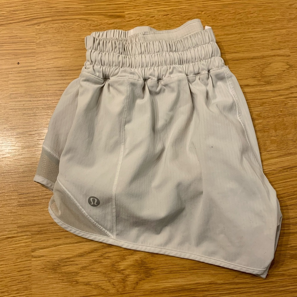 White lululemon running shorts. Size 6